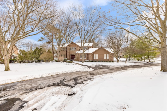 traditional-style home featuring brick siding