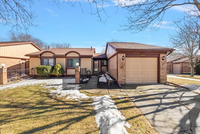 view of front of property featuring a garage, brick siding, driveway, and fence