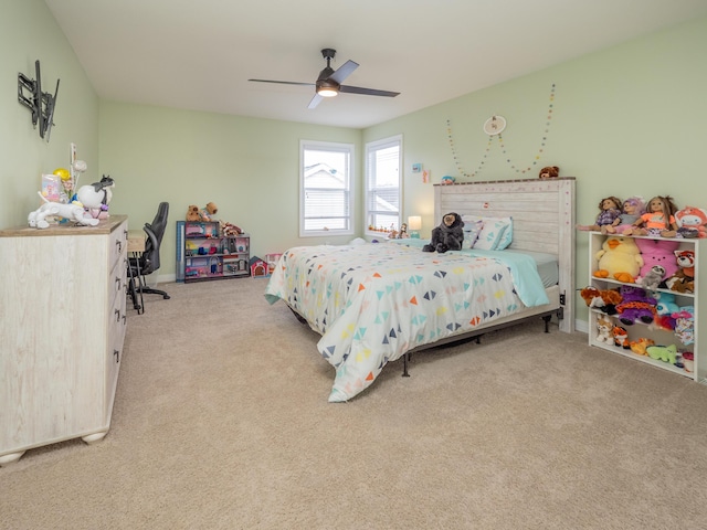 carpeted bedroom featuring a ceiling fan