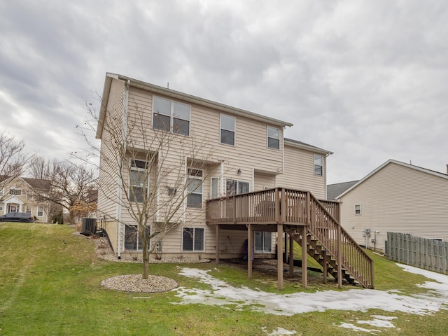 back of property featuring stairs, a yard, central AC unit, and a deck