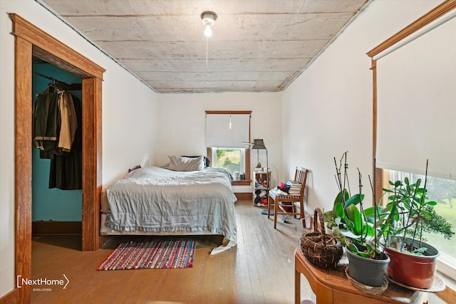 bedroom featuring hardwood / wood-style flooring