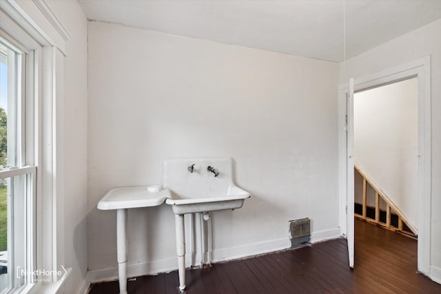 bathroom featuring visible vents, baseboards, and hardwood / wood-style flooring