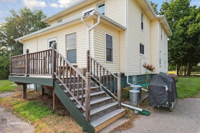 exterior space featuring a wooden deck