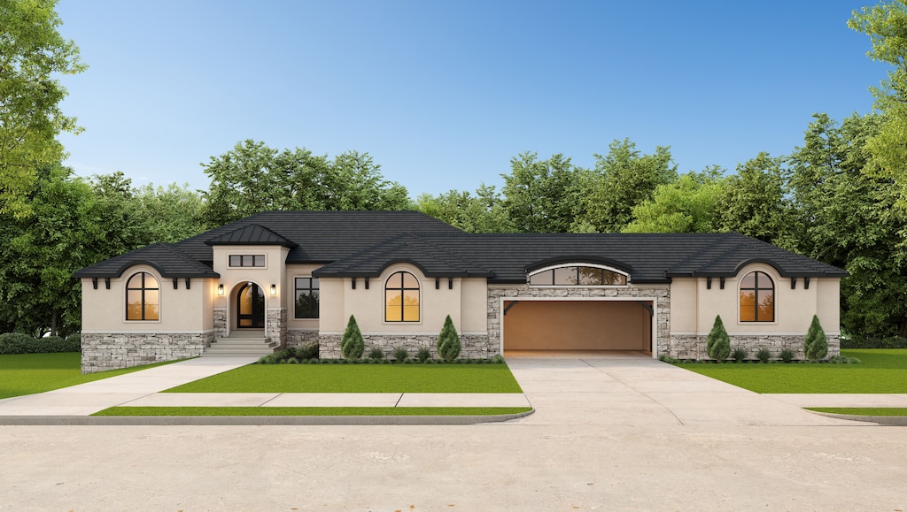 french country home featuring concrete driveway, a front lawn, and stucco siding