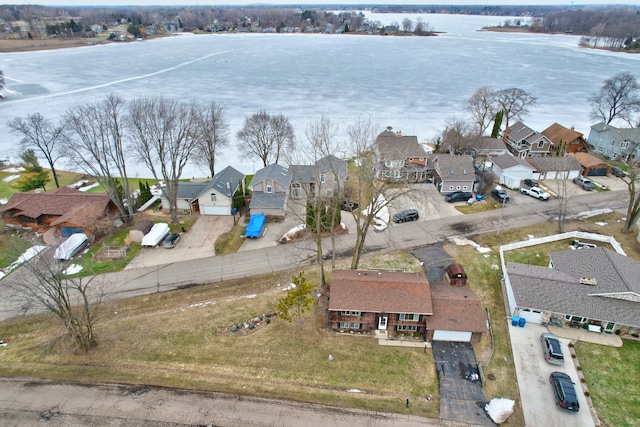 aerial view featuring a residential view and a water view