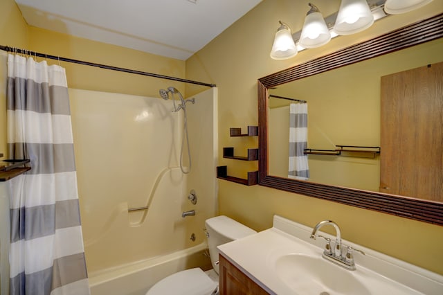 bathroom featuring toilet, vanity, and shower / bathtub combination with curtain