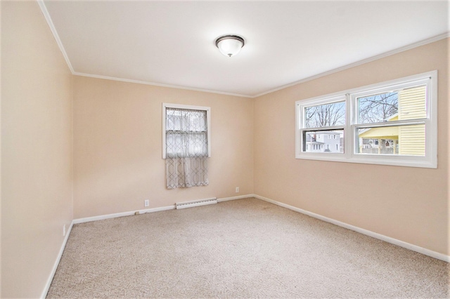 carpeted empty room featuring baseboards, baseboard heating, and crown molding