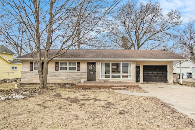 ranch-style home with a garage, stone siding, and driveway