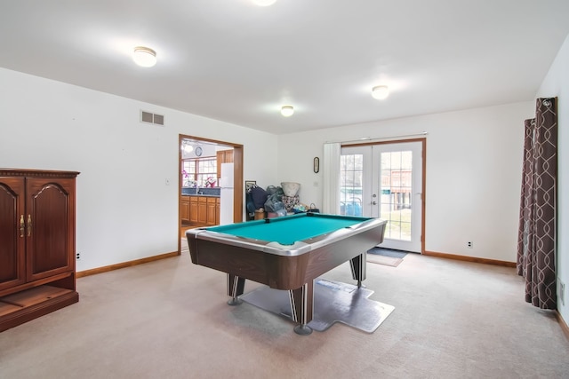 playroom with light colored carpet, billiards, visible vents, baseboards, and french doors