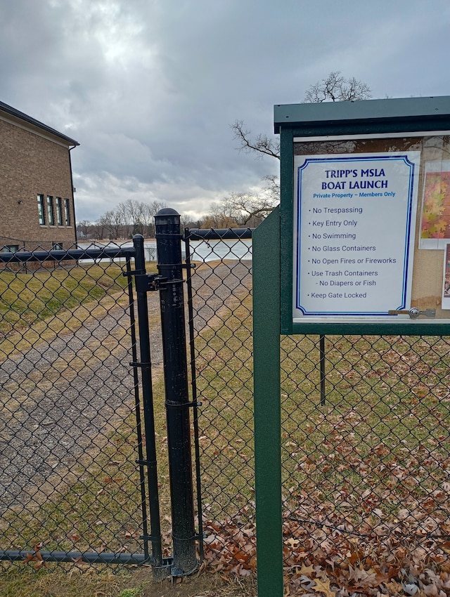 exterior details with a gate and fence