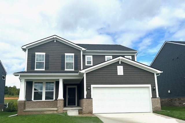 craftsman-style house featuring a porch, brick siding, driveway, and an attached garage