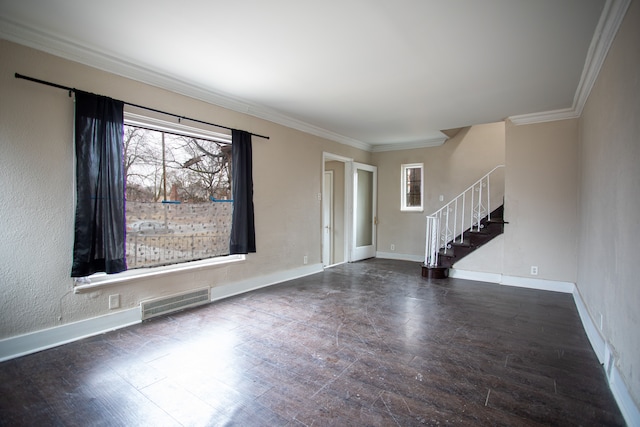 interior space featuring visible vents, crown molding, stairway, and wood finished floors