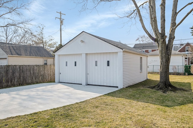 garage with fence