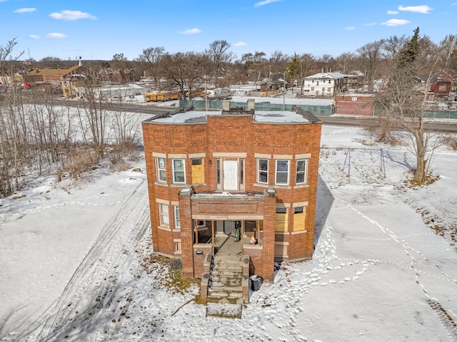 view of front of house featuring a residential view and brick siding