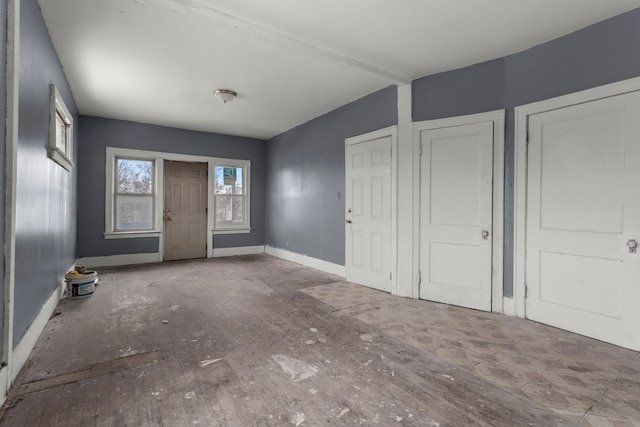 entrance foyer featuring baseboards