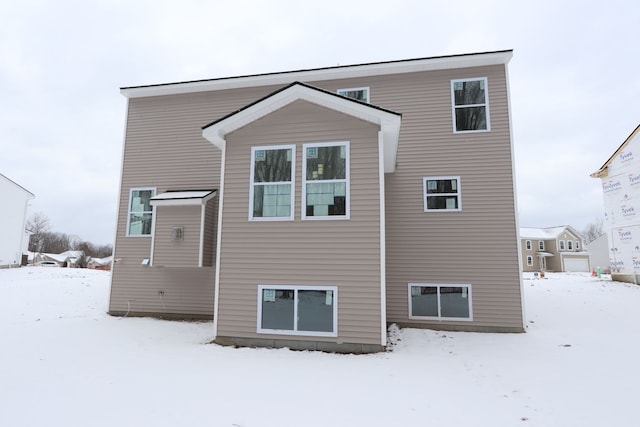 view of snow covered property