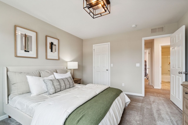 bedroom with visible vents, baseboards, and carpet floors