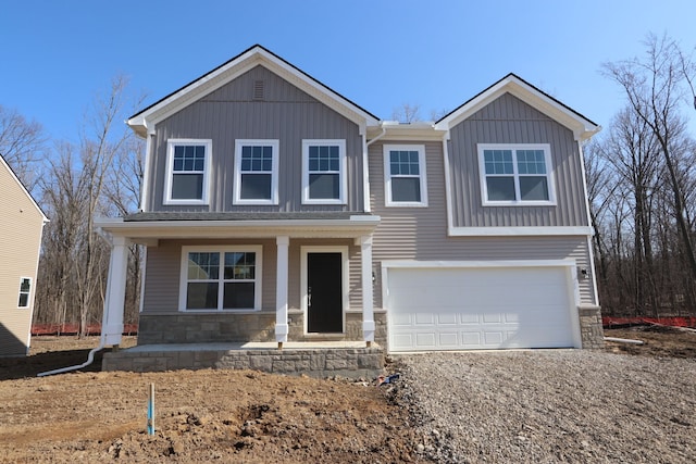 view of front facade featuring covered porch and board and batten siding