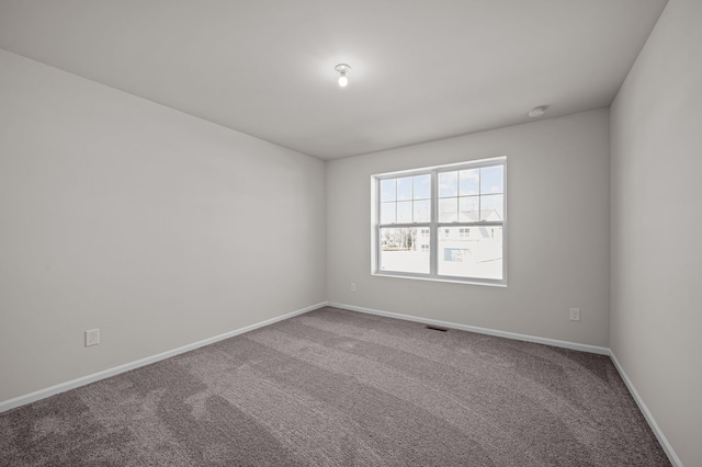 4278 Oak St, Grand Blanc, MI 48439 - carpeted empty room with baseboards and visible vents
