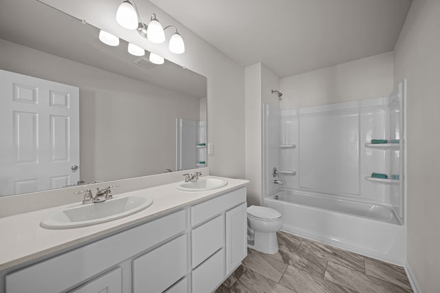 4278 Oak St, Grand Blanc, MI 48439 - bathroom featuring a sink, toilet, double vanity, and shower / tub combination