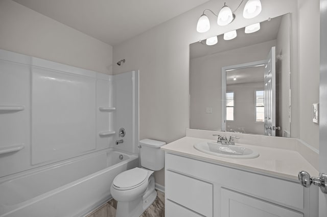 4278 Oak St, Grand Blanc, MI 48439 - bathroom with baseboards, bathing tub / shower combination, toilet, and vanity