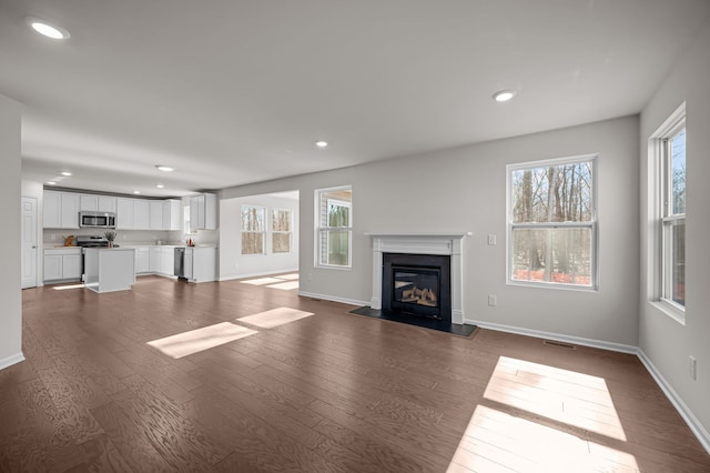 4278 Oak St, Grand Blanc, MI 48439 - unfurnished living room featuring recessed lighting and dark wood-type flooring