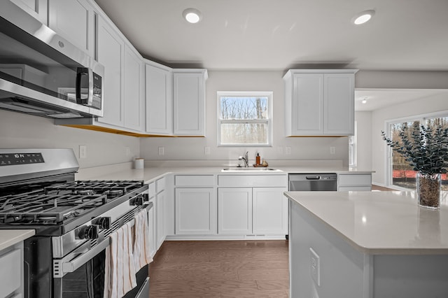 4278 Oak St, Grand Blanc, MI 48439 - kitchen with light countertops, recessed lighting, appliances with stainless steel finishes, and a sink
