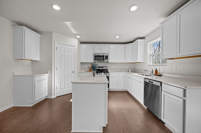 4278 Oak St, Grand Blanc, MI 48439 - kitchen with recessed lighting, appliances with stainless steel finishes, dark wood-style floors, and a sink