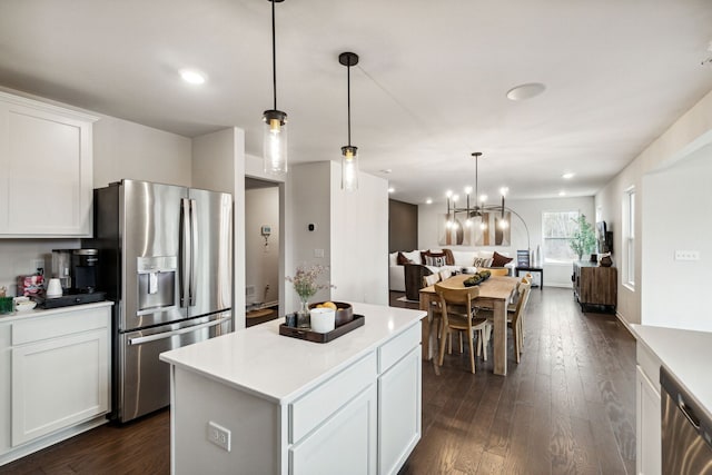 4278 Oak St, Grand Blanc, MI 48439 - kitchen featuring dark wood-type flooring, open floor plan, appliances with stainless steel finishes, and a kitchen island