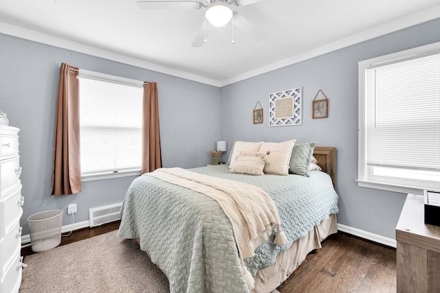 bedroom featuring ceiling fan, dark wood-type flooring, visible vents, baseboards, and crown molding