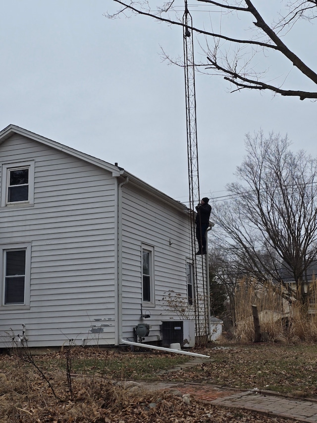 view of home's exterior featuring central AC unit