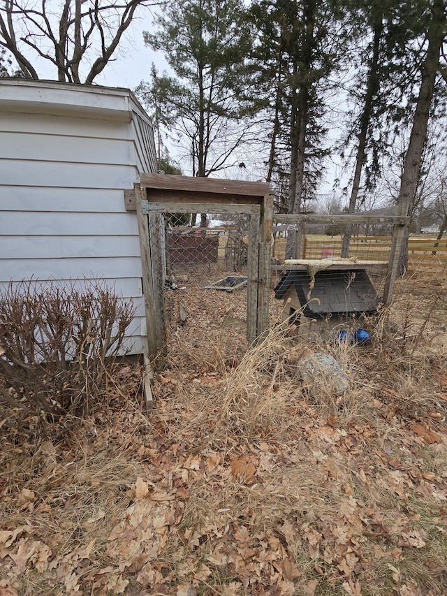 view of yard with an outdoor structure and exterior structure