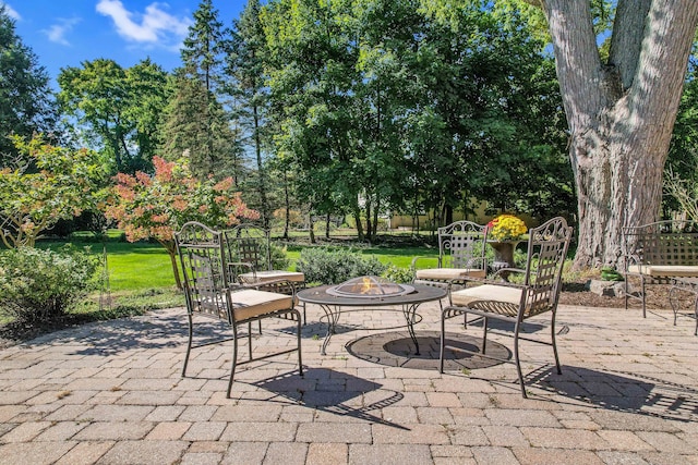 view of patio / terrace featuring a fire pit