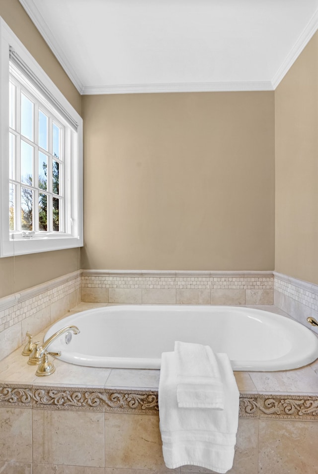 full bath with ornamental molding and a bath