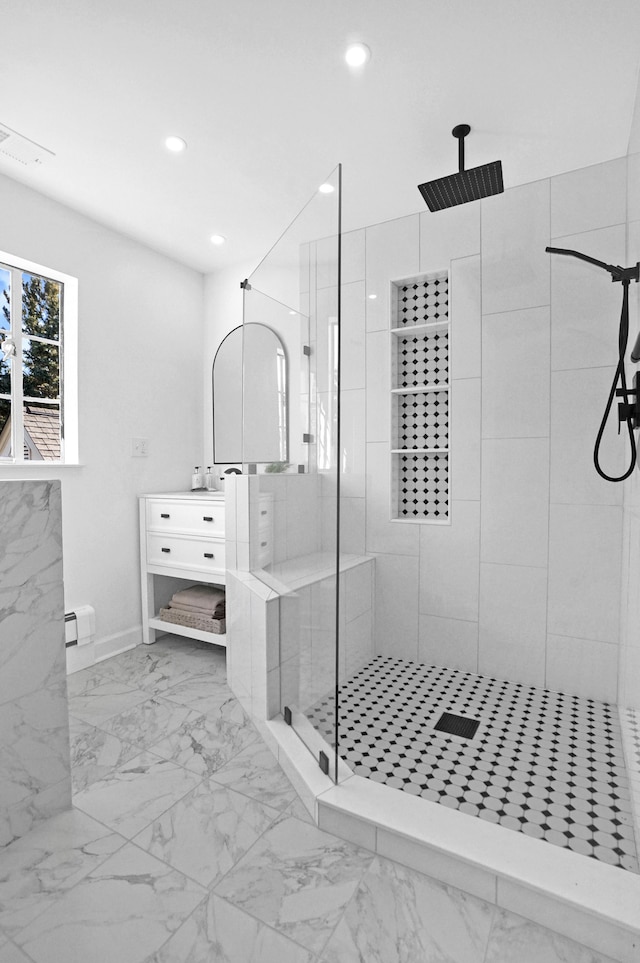 full bath with a baseboard radiator, marble finish floor, vanity, a shower stall, and recessed lighting