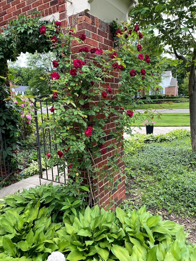 exterior details featuring brick siding