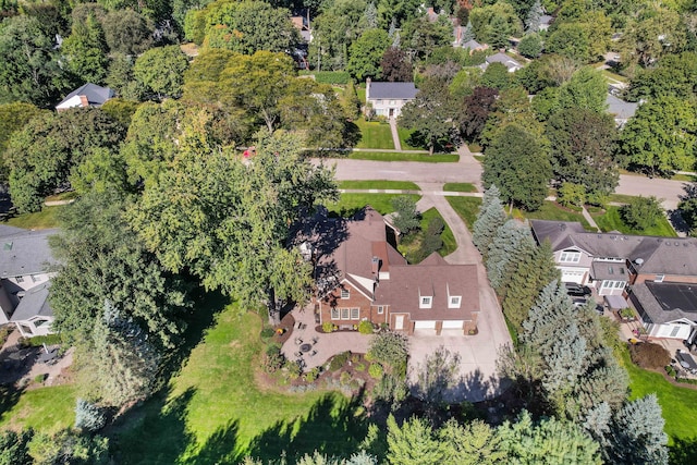 birds eye view of property with a residential view