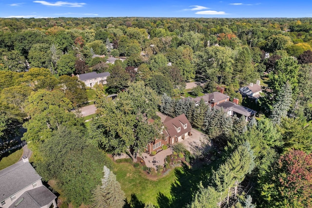 aerial view featuring a view of trees