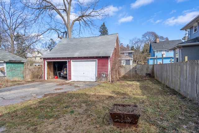 detached garage with fence