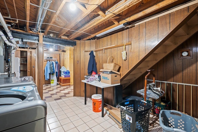 unfinished basement featuring wood walls