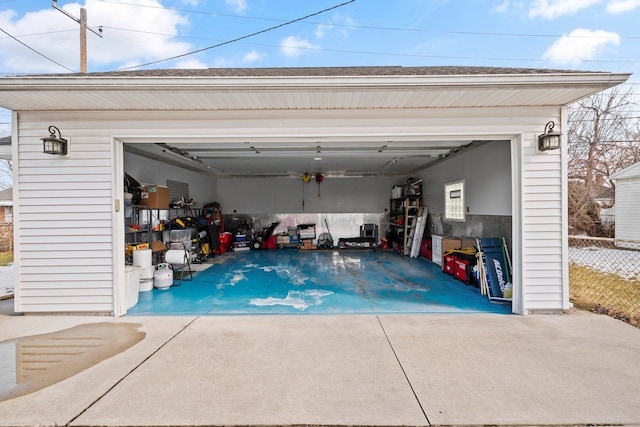 garage with fence