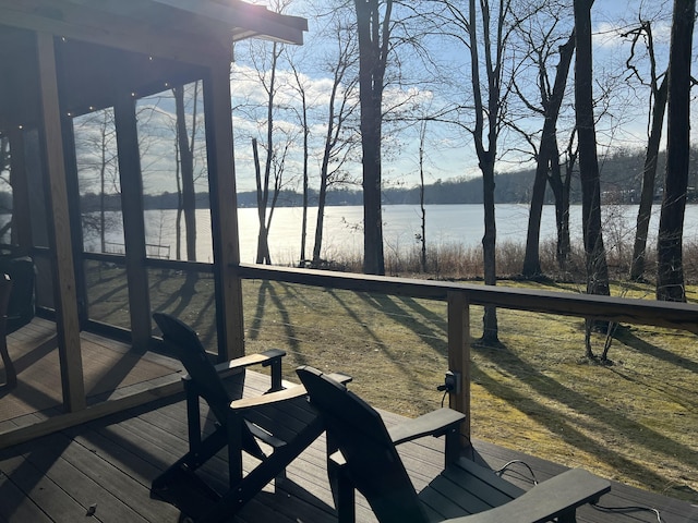 wooden deck with a water view