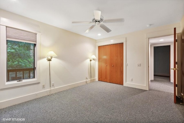 unfurnished bedroom with ceiling fan, recessed lighting, baseboards, a closet, and carpet