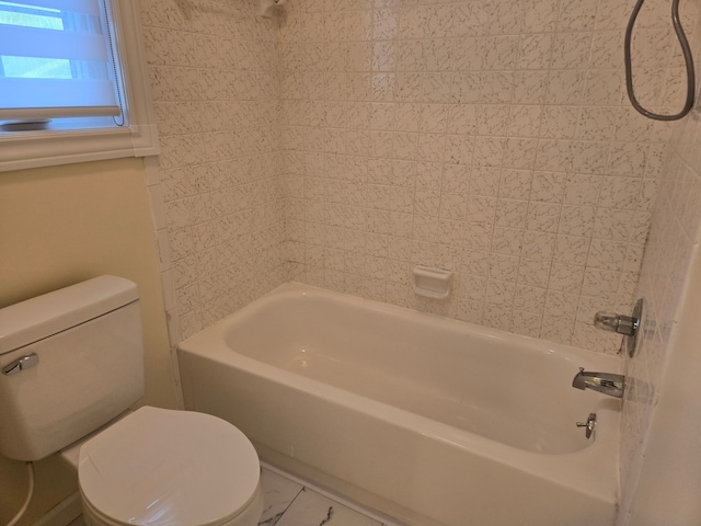 full bath featuring shower / bathtub combination and toilet