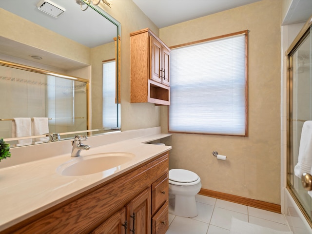 full bathroom featuring tile patterned floors, visible vents, toilet, baseboards, and vanity