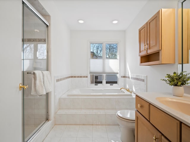 full bathroom with tile patterned flooring, a shower stall, toilet, a bath, and vanity