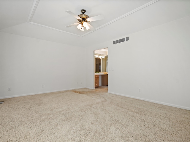 empty room with light carpet, a ceiling fan, visible vents, and baseboards