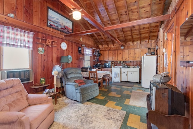 living room featuring plenty of natural light, vaulted ceiling with beams, wooden ceiling, and wooden walls