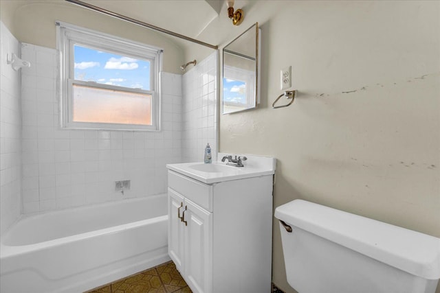 bathroom with shower / tub combination, vanity, and toilet