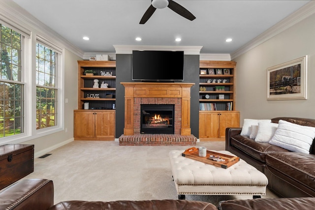 living area with light carpet, a brick fireplace, visible vents, and crown molding